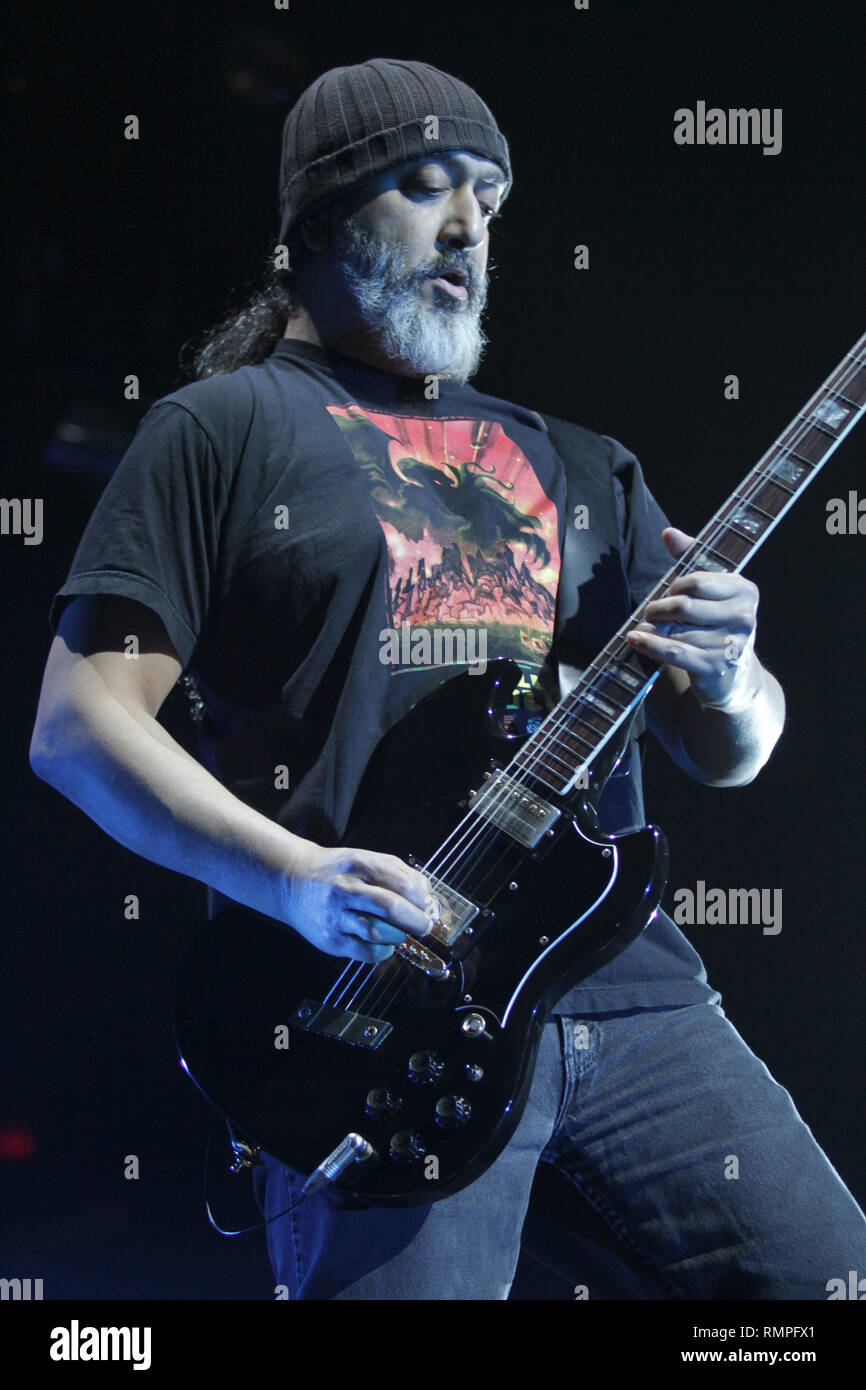 Guitarist Kim Thayil is shown performing on stage during a 'live' concert appearance with Soundgarden. Stock Photo