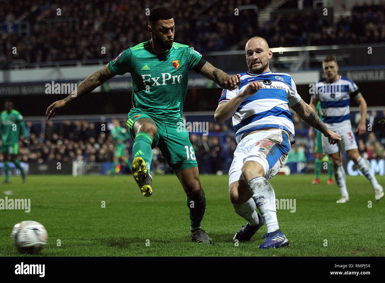 London, UK. 15th Feb, 2019. Toni Leistner of Queens Park Rangers (R) in action with Andre Gray of Watford (L). The Emirates FA Cup, 5th round match, Queens Park Rangers v Watford at Loftus Road stadium in London on Friday 15th February 2019.  this image may only be used for Editorial purposes. Editorial use only, license required for commercial use. No use in betting, games or a single club/league/player publications. pic by Steffan Bowen/Andrew Orchard sports photography/Alamy Live news Credit: Andrew Orchard sports photography/Alamy Live News Stock Photo