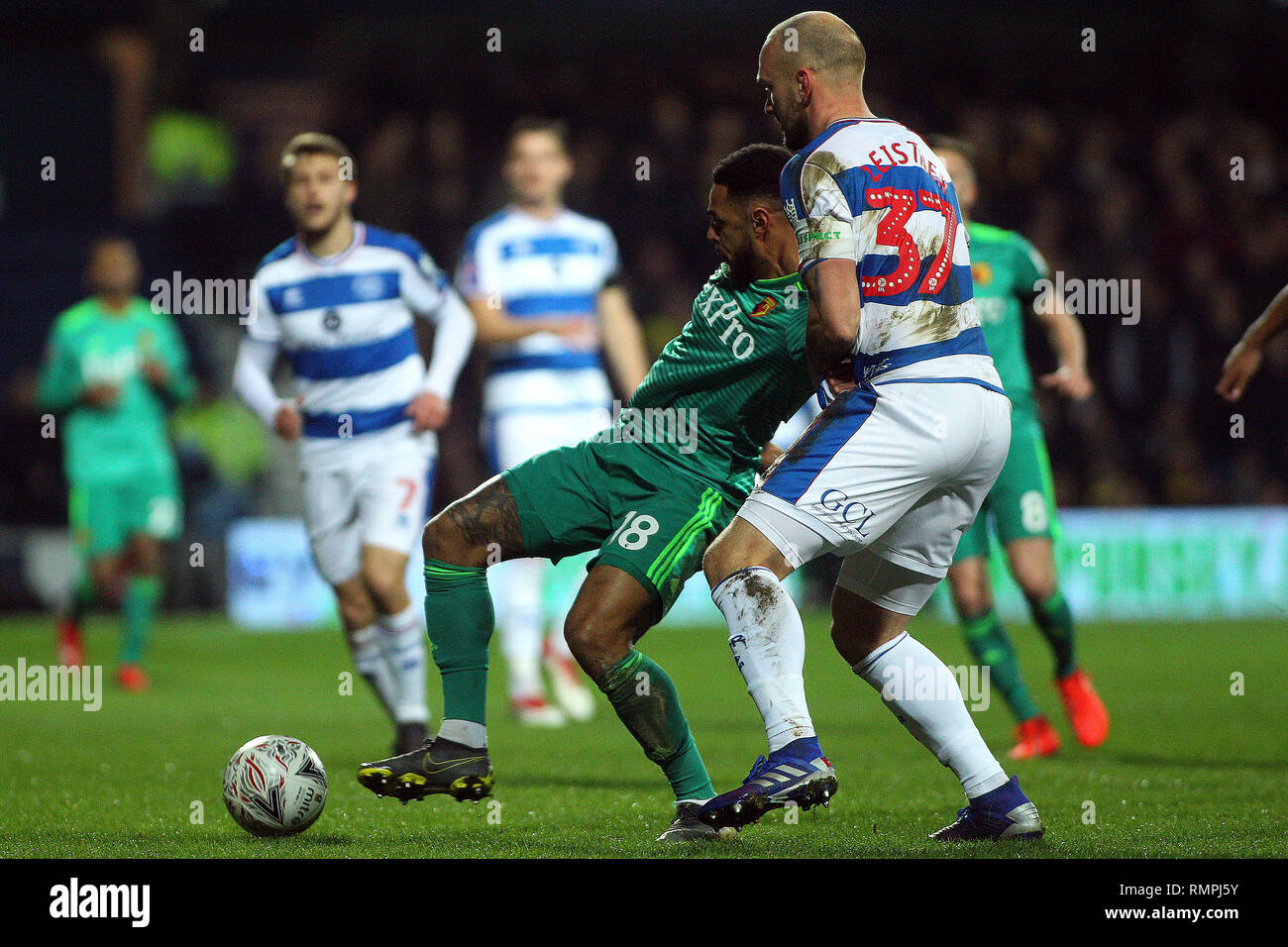 London, UK. 15th Feb, 2019. Toni Leistner of Queens Park Rangers (R) in action with Andre Gray of Watford (L). The Emirates FA Cup, 5th round match, Queens Park Rangers v Watford at Loftus Road stadium in London on Friday 15th February 2019.  this image may only be used for Editorial purposes. Editorial use only, license required for commercial use. No use in betting, games or a single club/league/player publications. pic by Steffan Bowen/Andrew Orchard sports photography/Alamy Live news Credit: Andrew Orchard sports photography/Alamy Live News Stock Photo