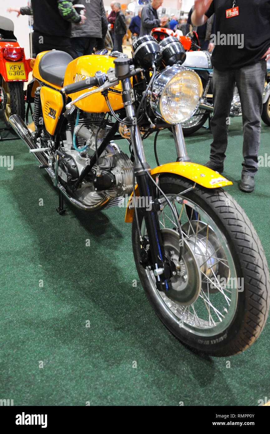 London, UK. 15th Feb, 2019. A vintage Ducati 750 Sport motorbike on display at the Carole Nash MCN London Motorcycle Show which is taking place at ExCel London, United Kingdom.  The show features a vast variety of wheeled transport from motorbikes, scooters and superbikes to customised one-off choppers from the world’s top motorcycle manufacturers, Around 40,000 fans are expected to visit the show, ranging from two wheel enthusiasts to baby boomer, born again bikers looking for their ultimate motorcycle for a dream roadtrip. Credit: Michael Preston/Alamy Live News Stock Photo