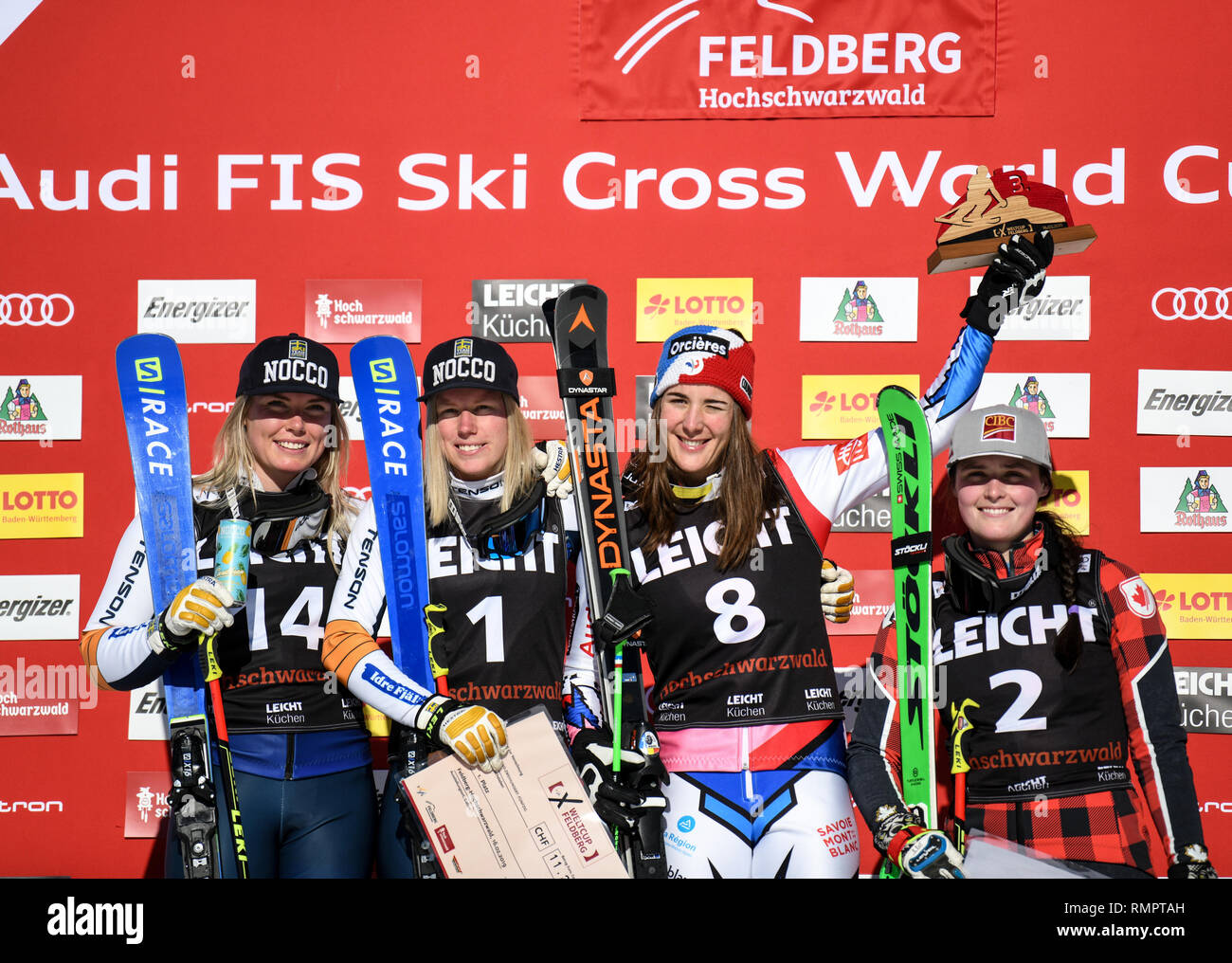 Feldberg, Germany. 16th Feb, 2019. Ski Cross: World Cup. Second placed Lisa Andersson (l-r) from Sweden, winner Sandra Naeslund from Sweden, third placed Alizee Baron from France and fourth placed Marielle Thompson from Canada are on the podium at the award ceremony. Credit: Patrick Seeger/dpa/Alamy Live News Stock Photo