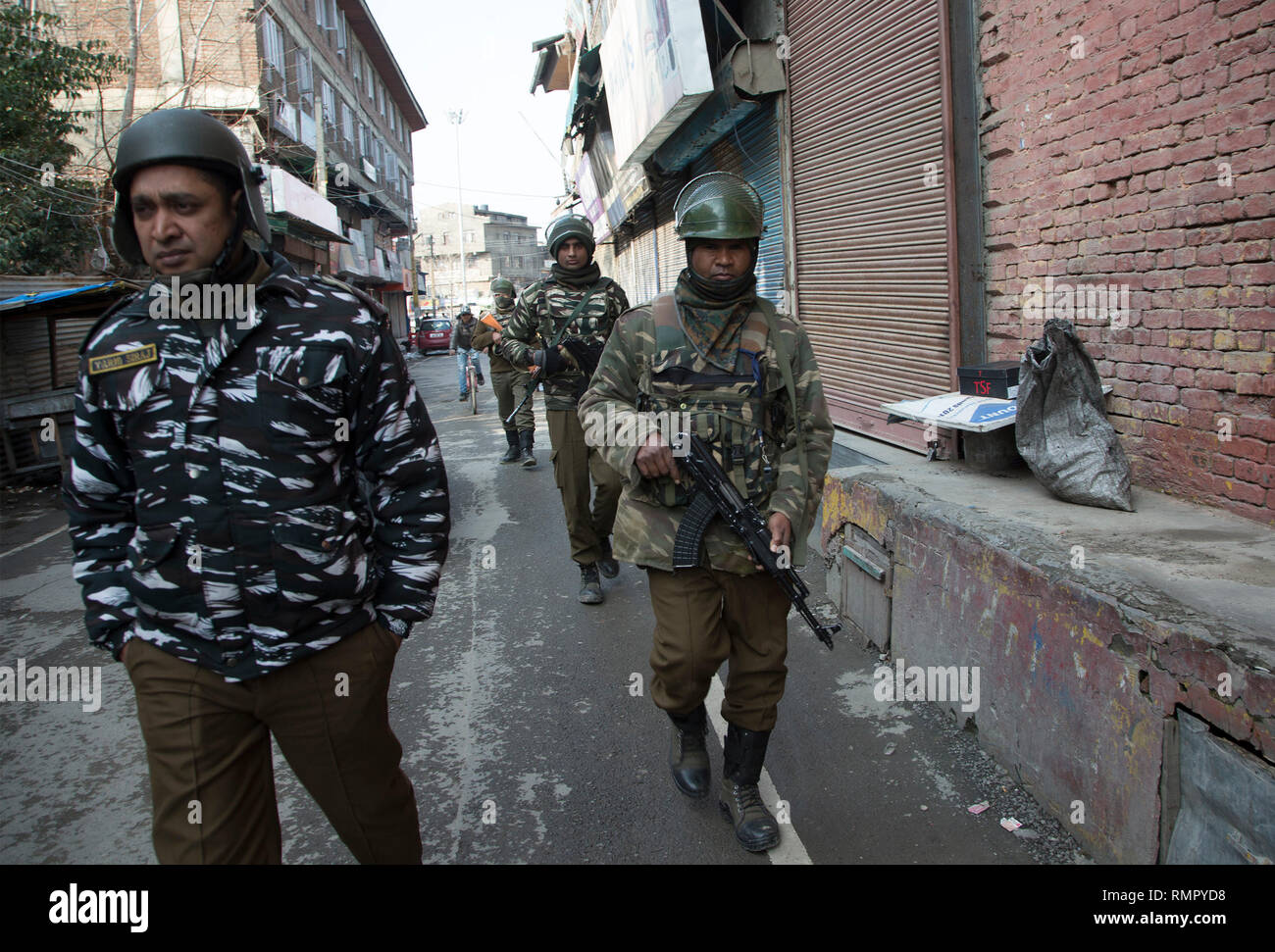 Srinagar, Indian-controlled Kashmir. 16th Feb, 2019. Indian paramilitary troopers patrol at a market place in Srinagar city, the summer capital of Indian-controlled Kashmir, Feb. 16, 2019. Authorities have beefed up security across Indian-controlled Kashmir after a suicide attack targeting paramilitary troopers of Central Reserve Police Force (CRPF) on Thursday killed 40 paramilitary troopers in the restive region, officials said. Credit: Javed Dar/Xinhua/Alamy Live News Stock Photo