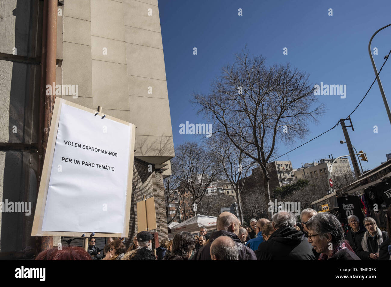 Barcelona, Catalonia, Spain. 16th Feb, 2019. A placard seen saying, neighbors do not want to be expropriated to make a theme park, during the protest.Neighbors affected by the expropriations of their homes for the plan to extend the temple of the Sagrada FamÃ-lia demonstrated in front of the temple. They are between 400 or 150 houses, depending on the final project, which must be expropriated to extend the stairway of the temple. The extension adds the problem of the excess of tourism. The neighbors of Sagrada Familia live immersed in a tourist flow that has been transforming the life of Credi Stock Photo