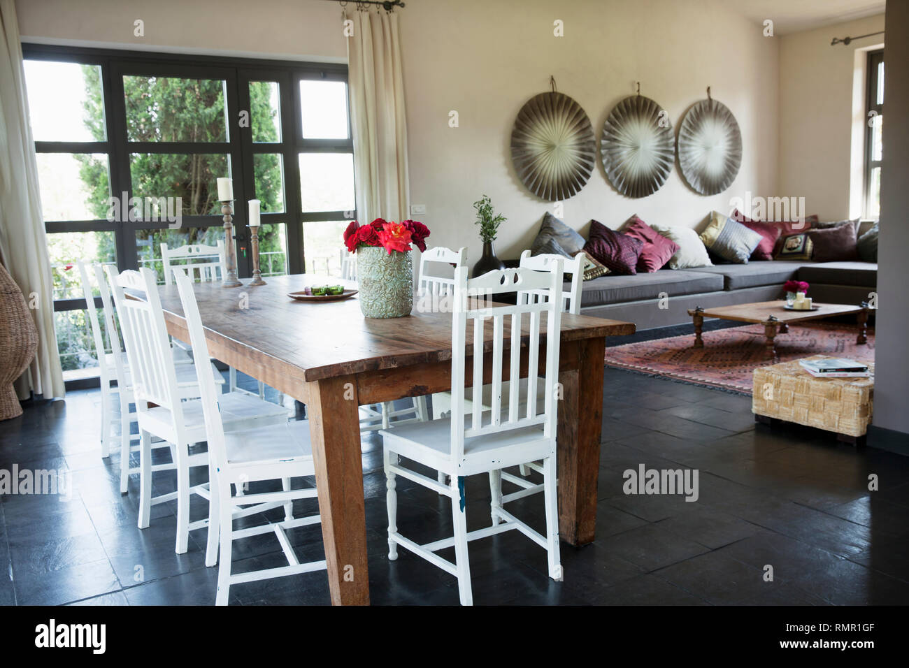 Dining table and living room Stock Photo - Alamy