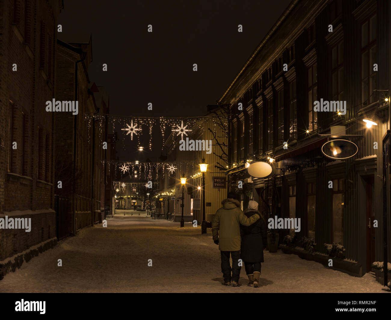 Woman street night rear view hi-res stock photography and images - Alamy