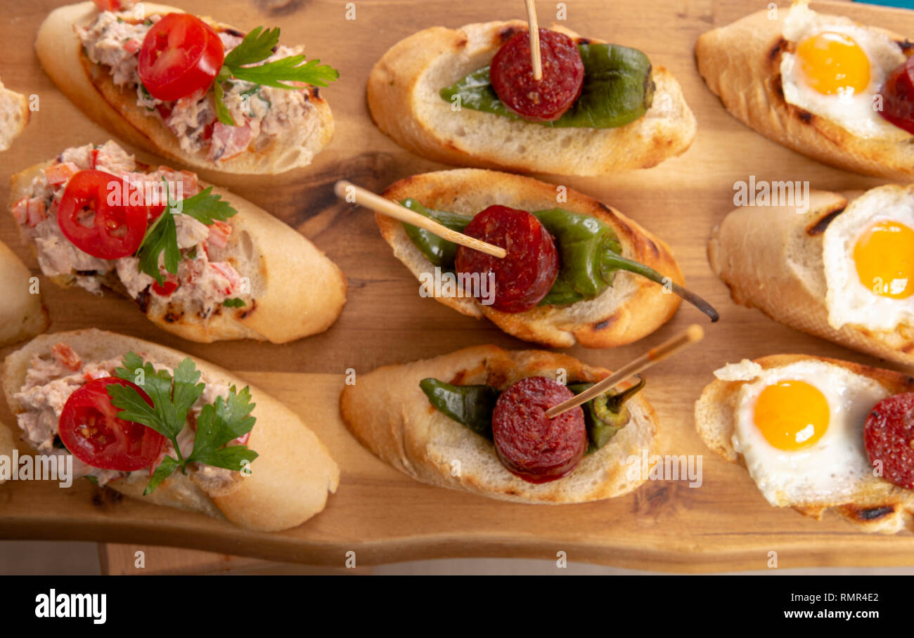 Top View Of A Variety Of Snacks Spanish Tapas Or Italian Antipasti Stock Photo Alamy