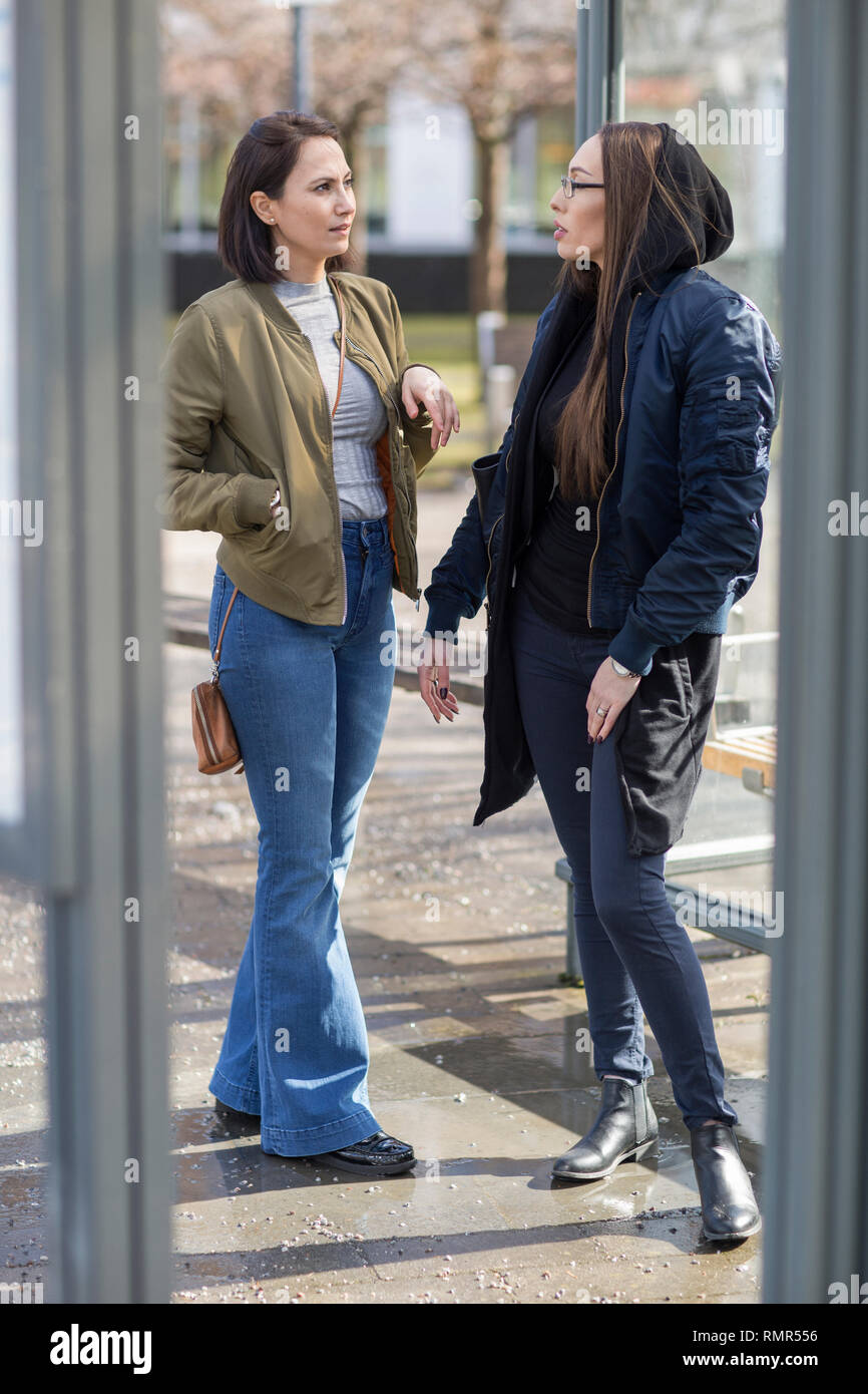 Talking on bus hi-res stock photography and images - Alamy