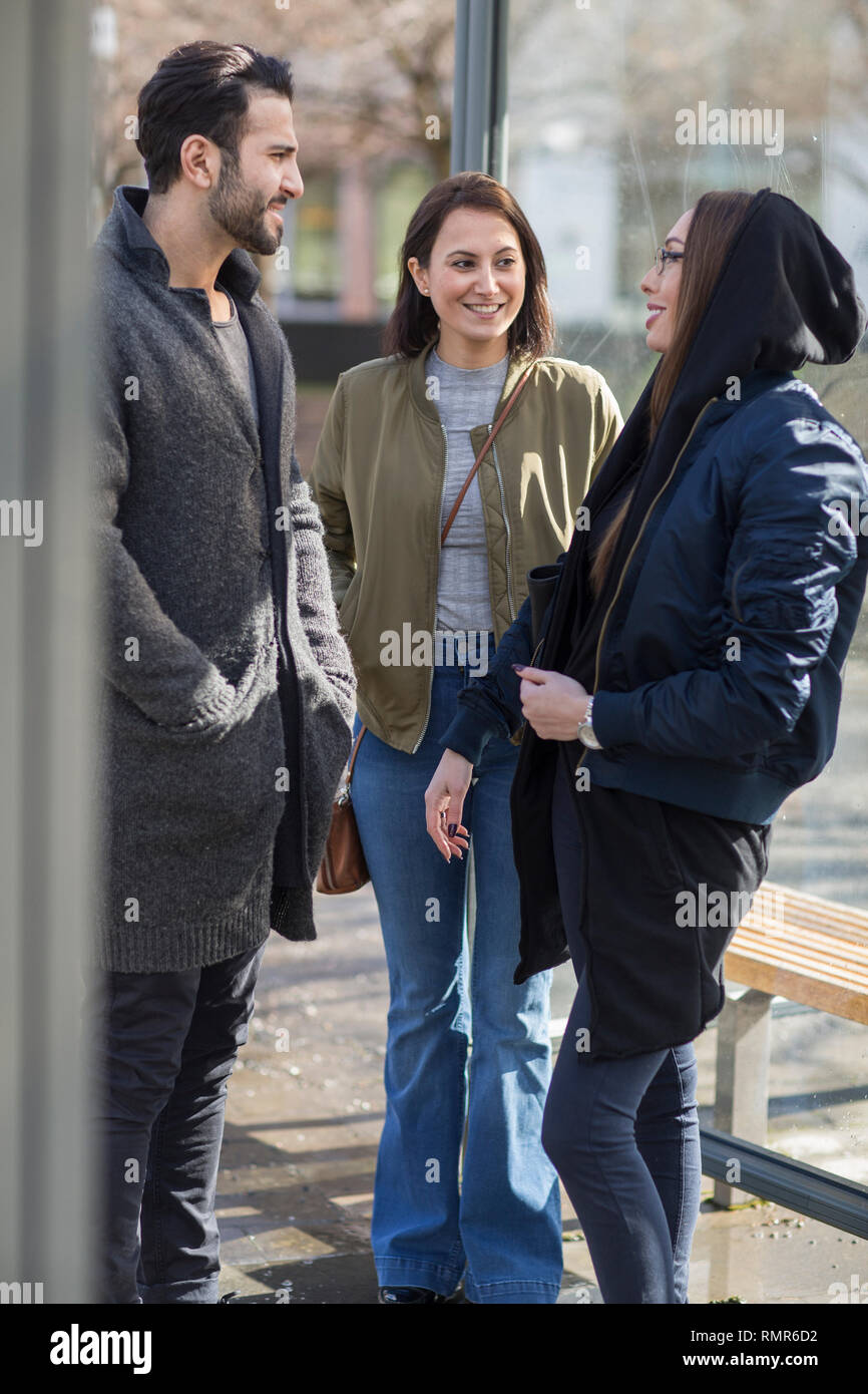 People talking bus shelter hi-res stock photography and images - Alamy