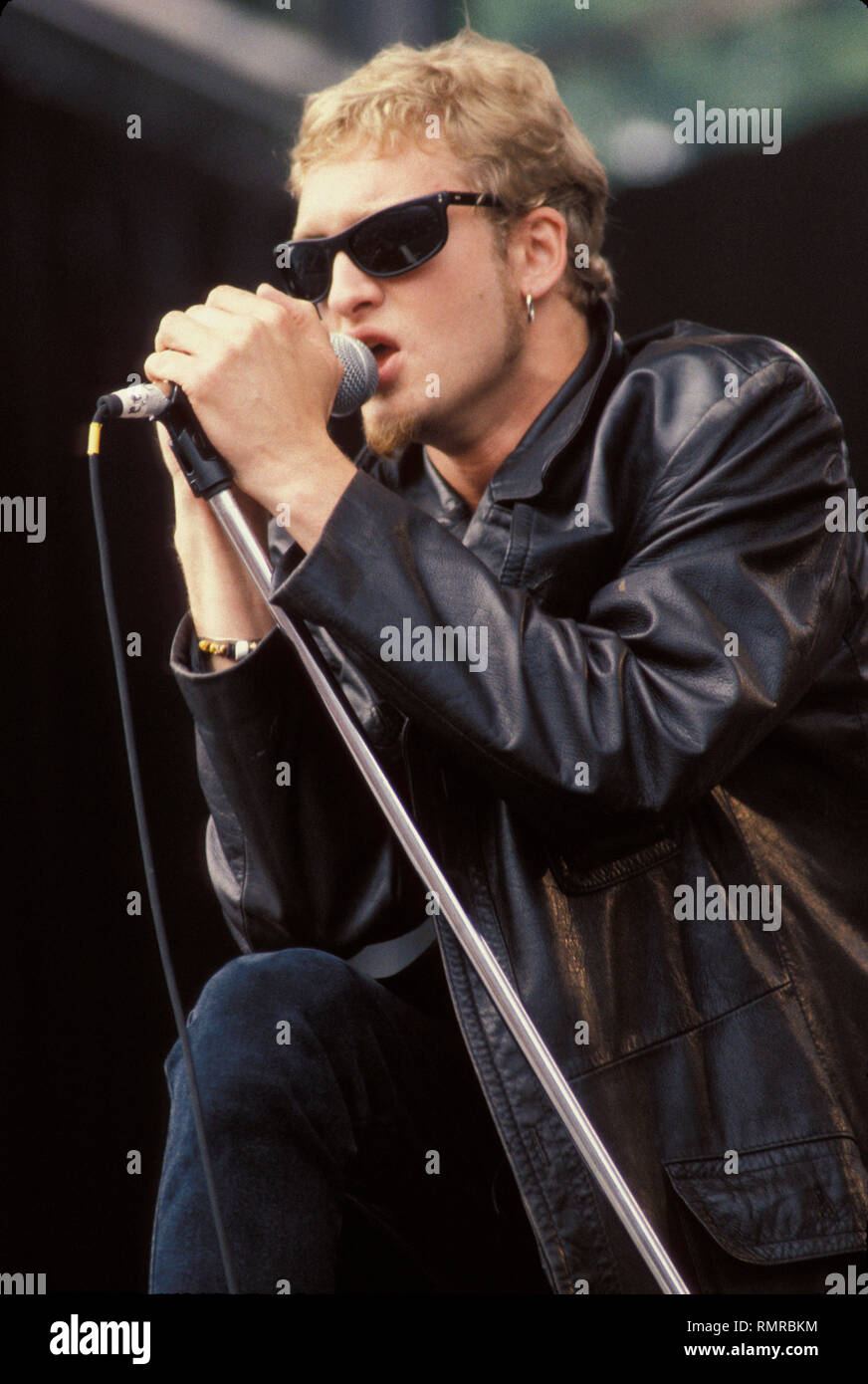 Singer Layne Staley is shown performing on stage during a 'live' concert appearance with Alice In Chains. Stock Photo