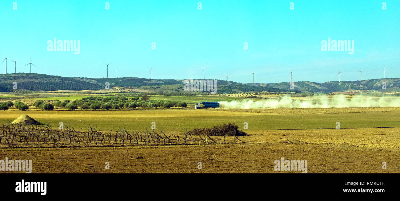 Spanish Truck Driving through dirt Roads and creating a cloud of dust Stock Photo Alamy