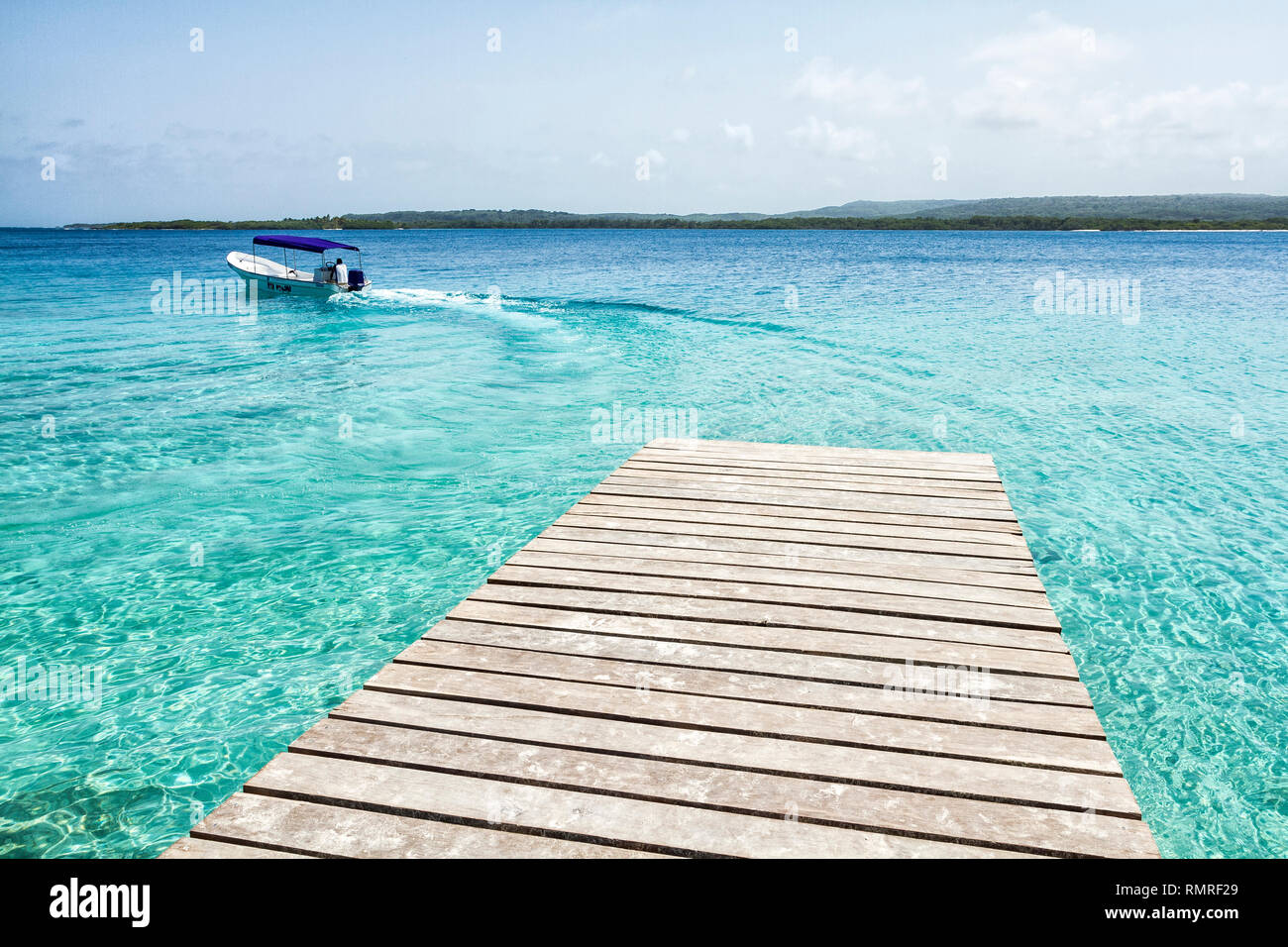 Pier over turquoise clear water at Cayo Sombrero (Sombrero Island). Chichiriviche, Falcon State, Venezuela. Stock Photo