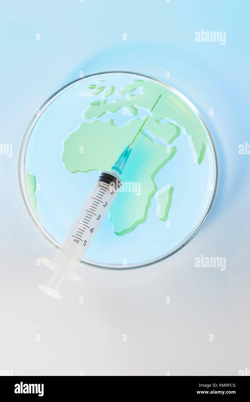 Petri dish with Africa map and syringe, conceptual image Stock Photo