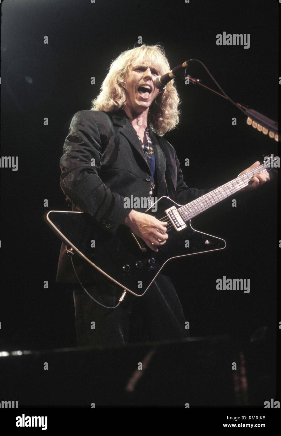 Singer, songwriter and guitarist Tommy Shaw of the rock band Styx is shown performing on stage during a 'live' concert appearance. Stock Photo