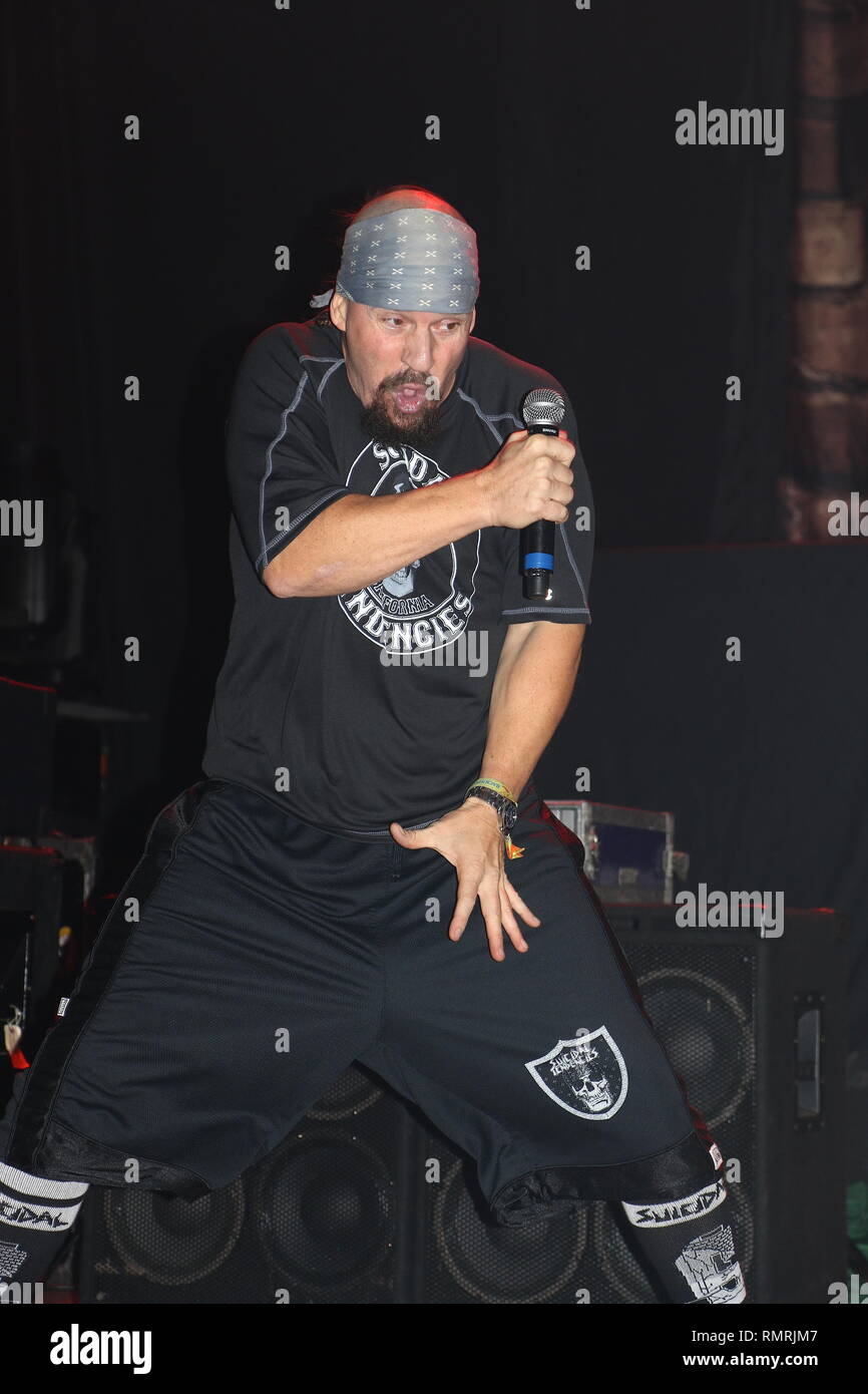 Singer Mike Muir is shown performing on stage during a 'live' in concert appearance with Suicidal Tendancies. Stock Photo