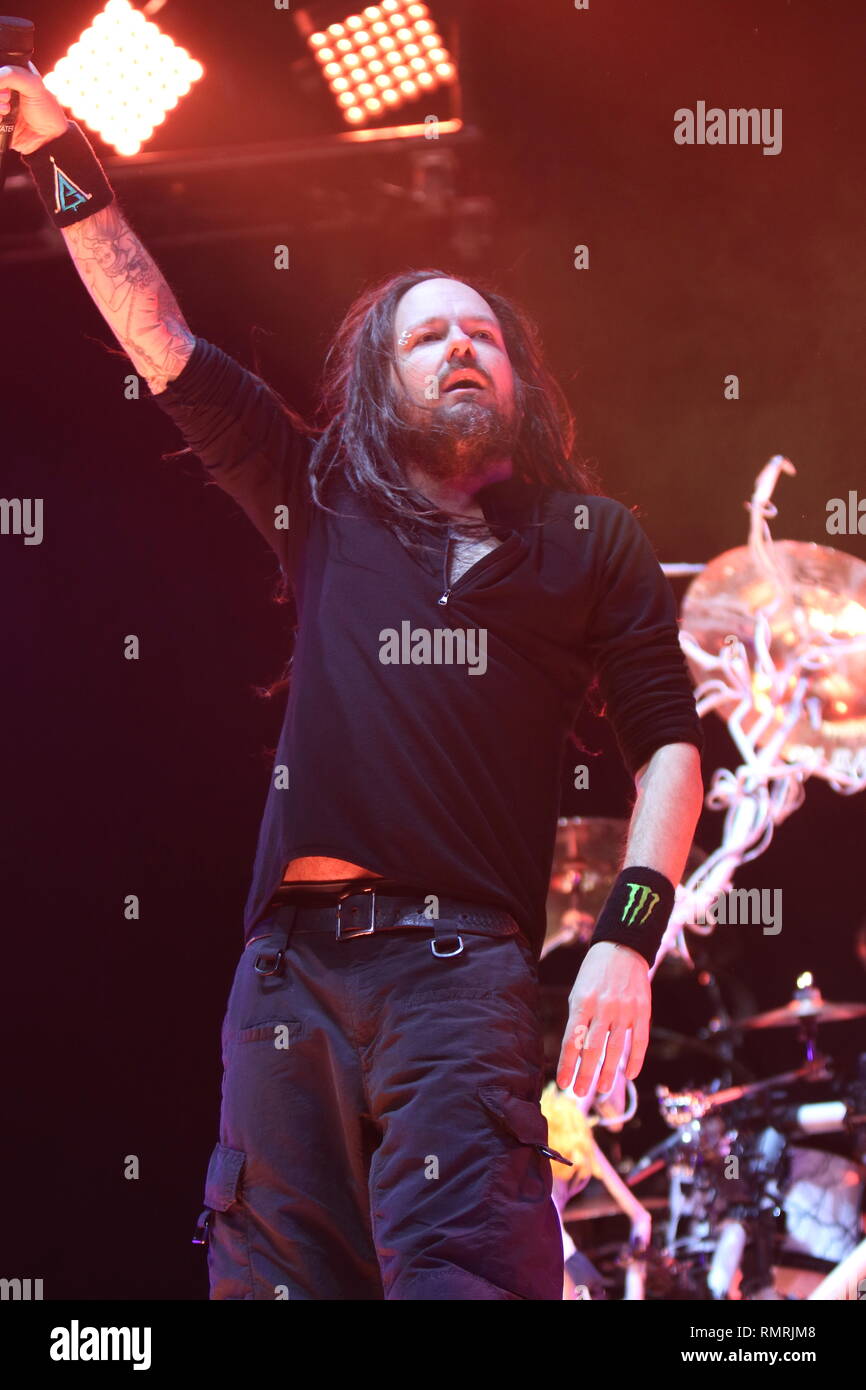 Lead singer Jonathan Davis is shown performing on stage during a 'live' concert appearance with Korn. Stock Photo