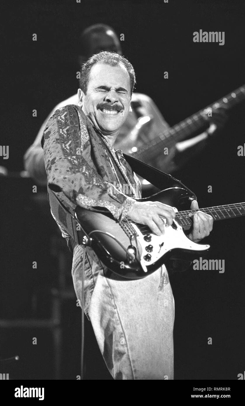 Guitarist Julio Fernandez of the jazz fusion band Spyro Gyra is shown  performing on stage during a "live" concert appearance Stock Photo - Alamy