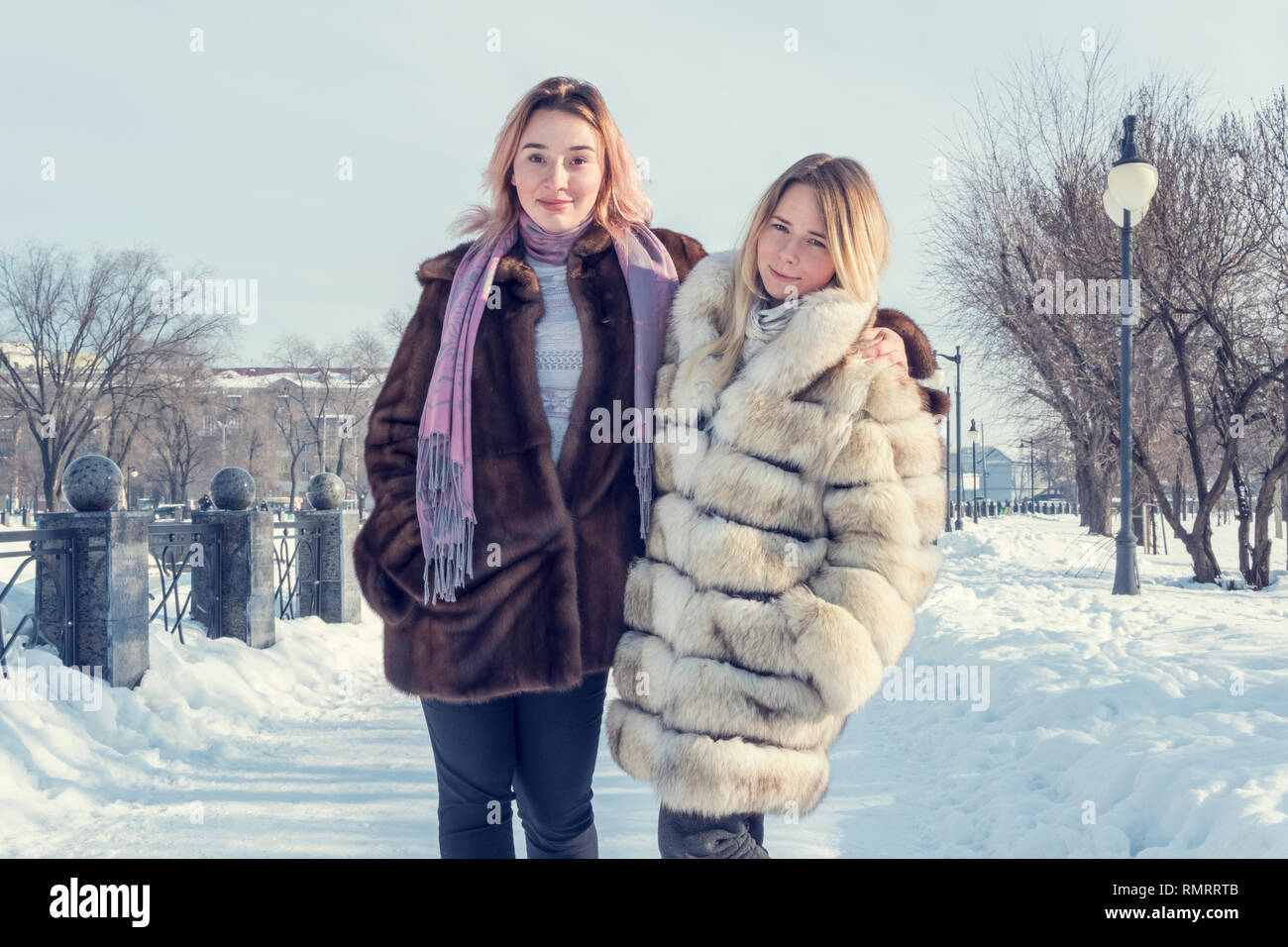 Two women in fur coats hi-res stock photography and images - Alamy