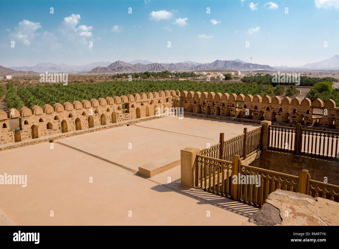 Terrace of the fort of Jabrin and in the background of Bahla and date crops (Oman) Stock Photo