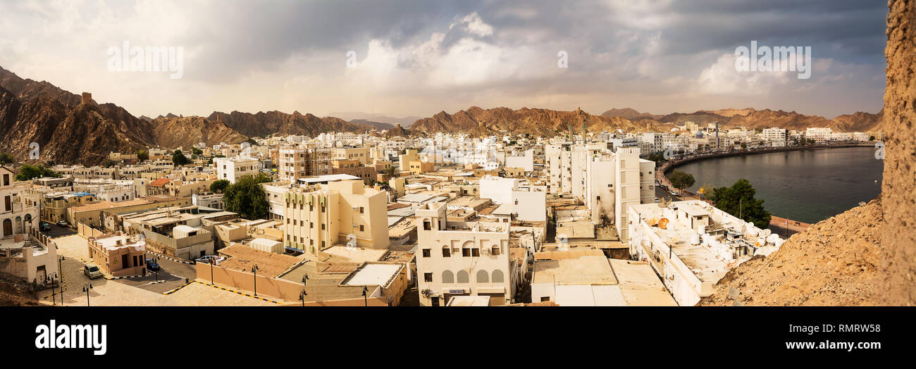 Mutrah waterfront with Mosque in Muscat at sunset and Corniche with nobody Stock Photo