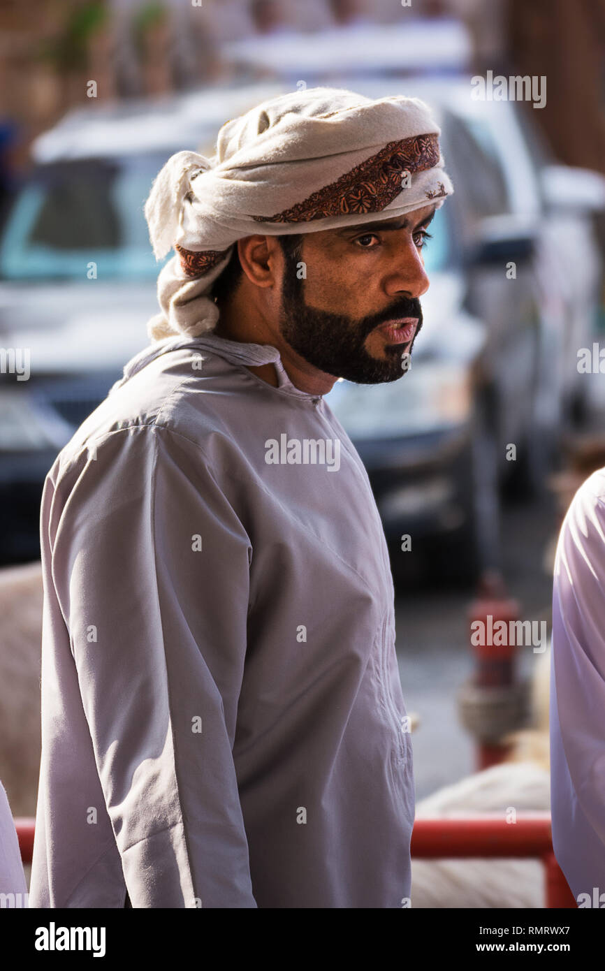 Nizwa, Oman - November 2, 2018: Young Omani man at the Nizwa Friday market Stock Photo