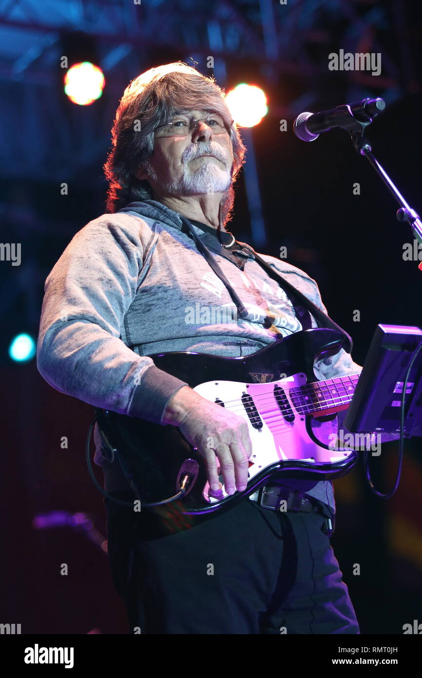 Singer and guitarist, Randy Owen of the country rock band Alabama is shown  performing on stage during a 