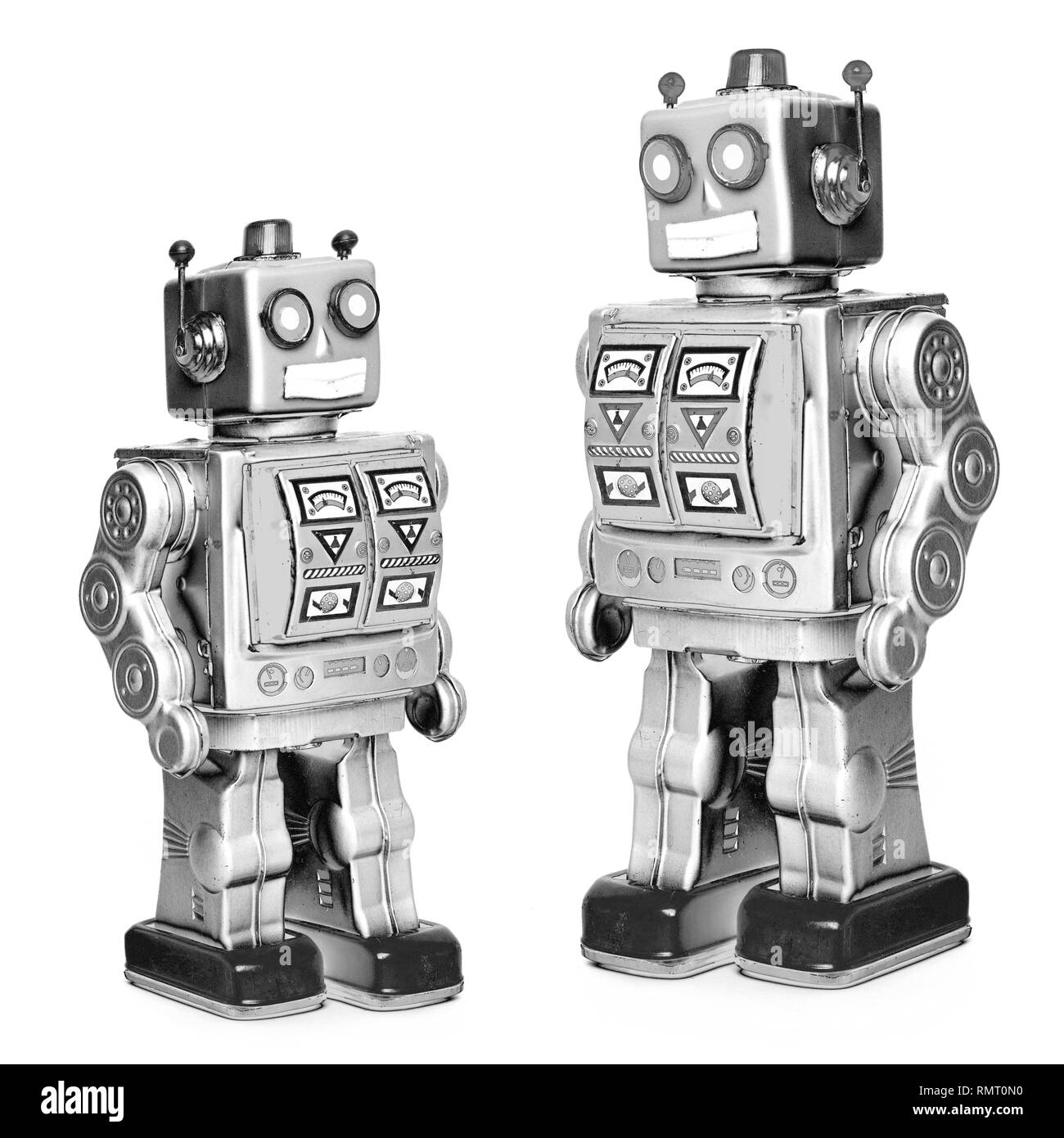 father and son robots on white monochrome  light Stock Photo