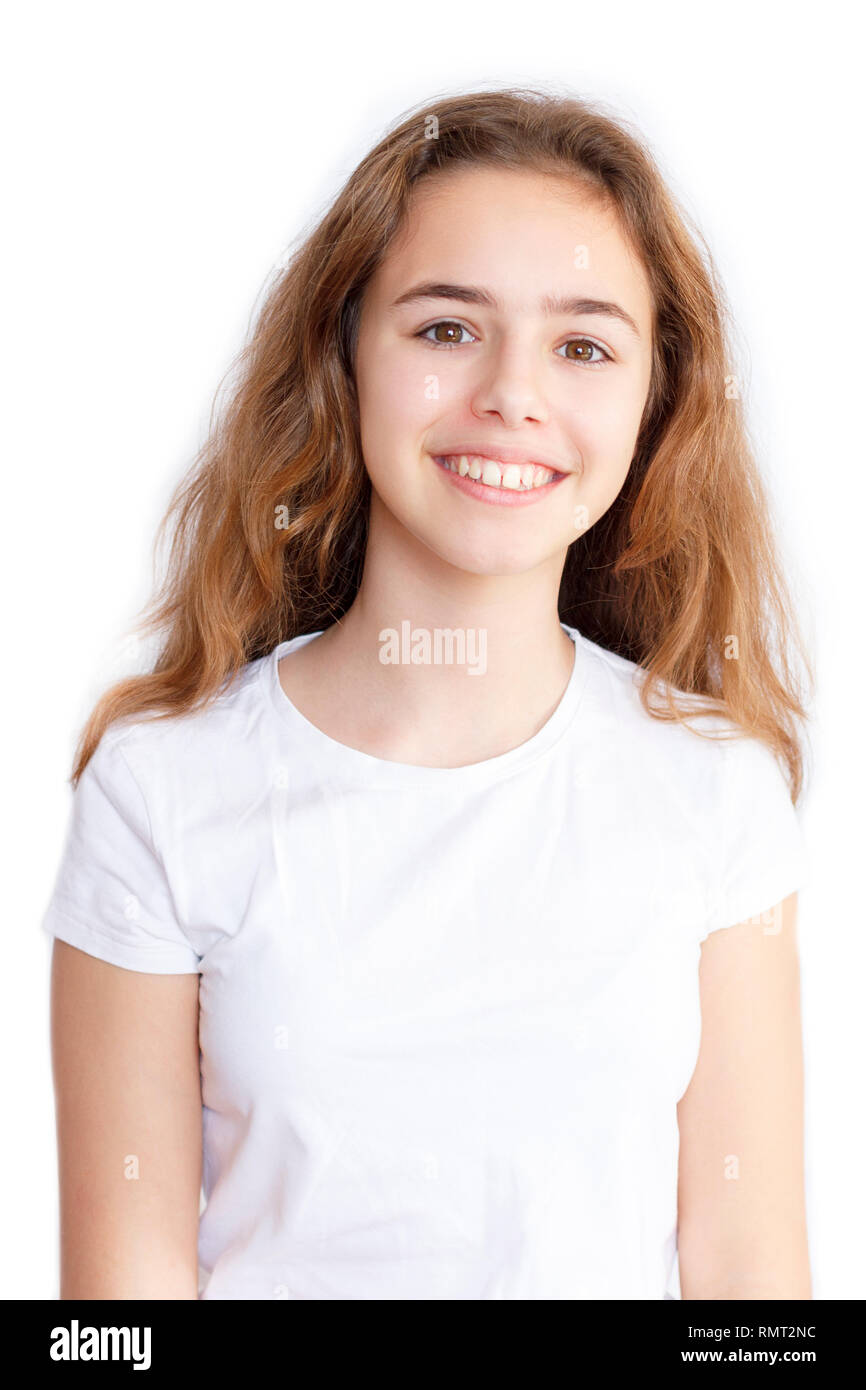 Beautiful teen girl in white t-shirt smiling to camera Stock Photo