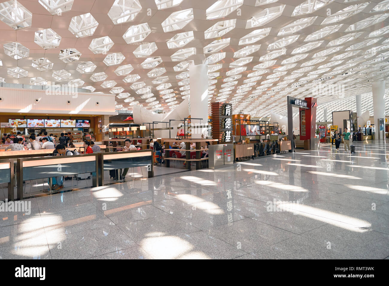 SHENZHEN, CHINA - CIRCA MAY, 2016: inside of Shenzhen Bao'an International Airport. It is located near Huangtian and Fuyong villages in Bao'an Distric Stock Photo