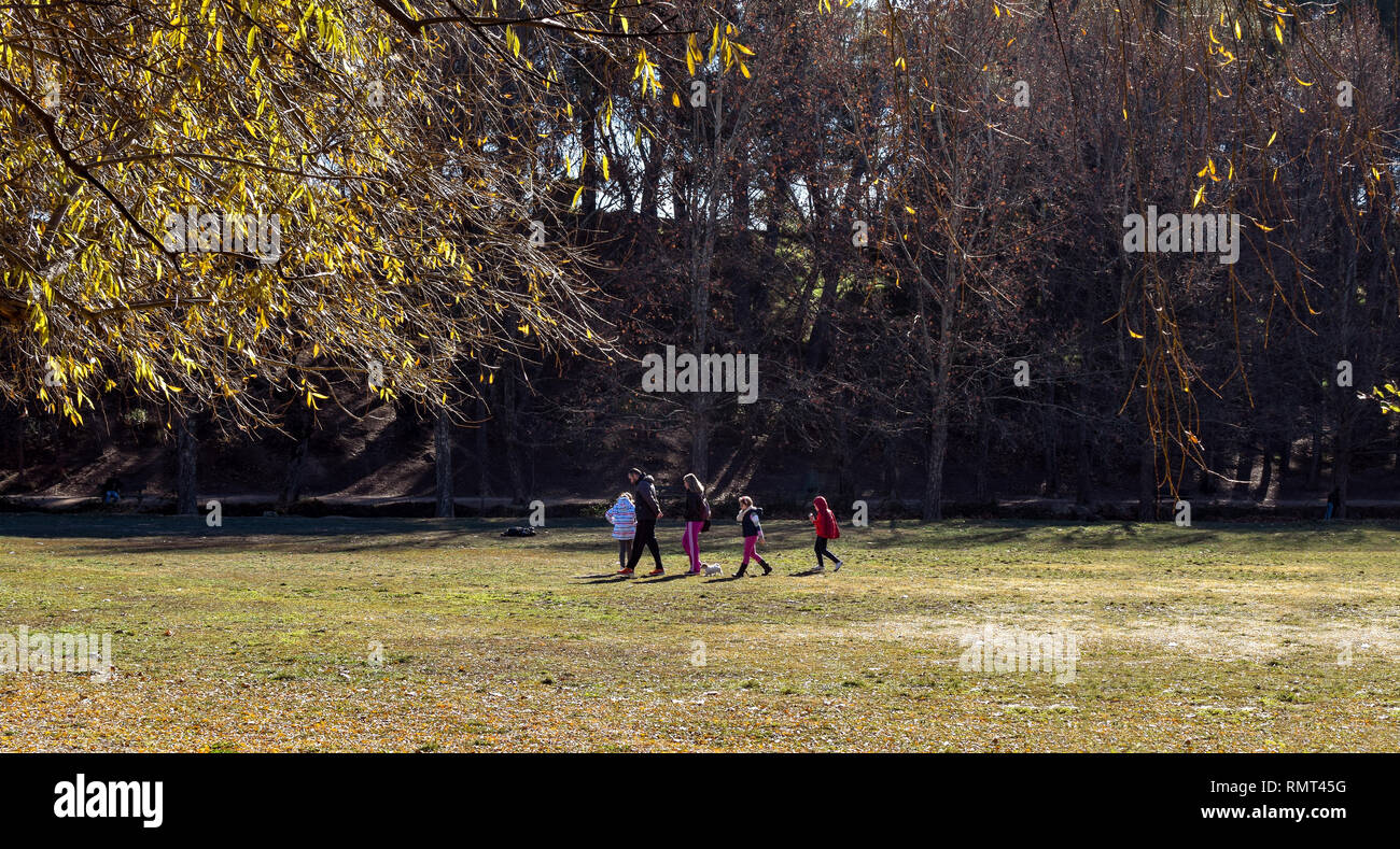 Caravaca, Spain, January 7, 2019: Family spend leisure time in sunny weather at the natural park. Families with children and dog enjoy vacations, holidays. Stock Photo