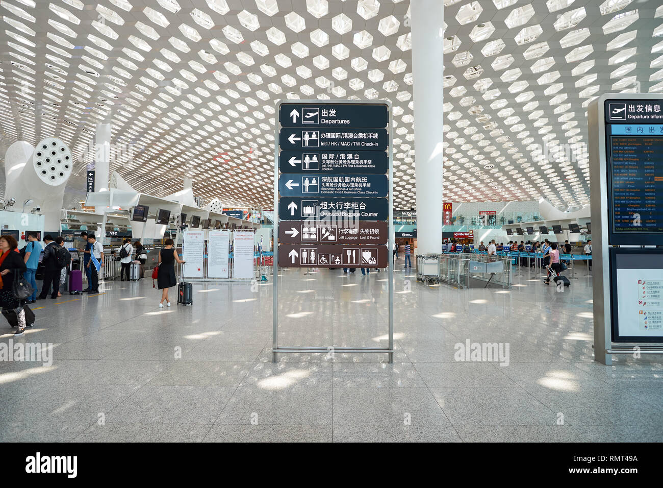 SHENZHEN, CHINA - CIRCA MAY, 2016: inside of Shenzhen Bao'an International Airport. It is located near Huangtian and Fuyong villages in Bao'an Distric Stock Photo