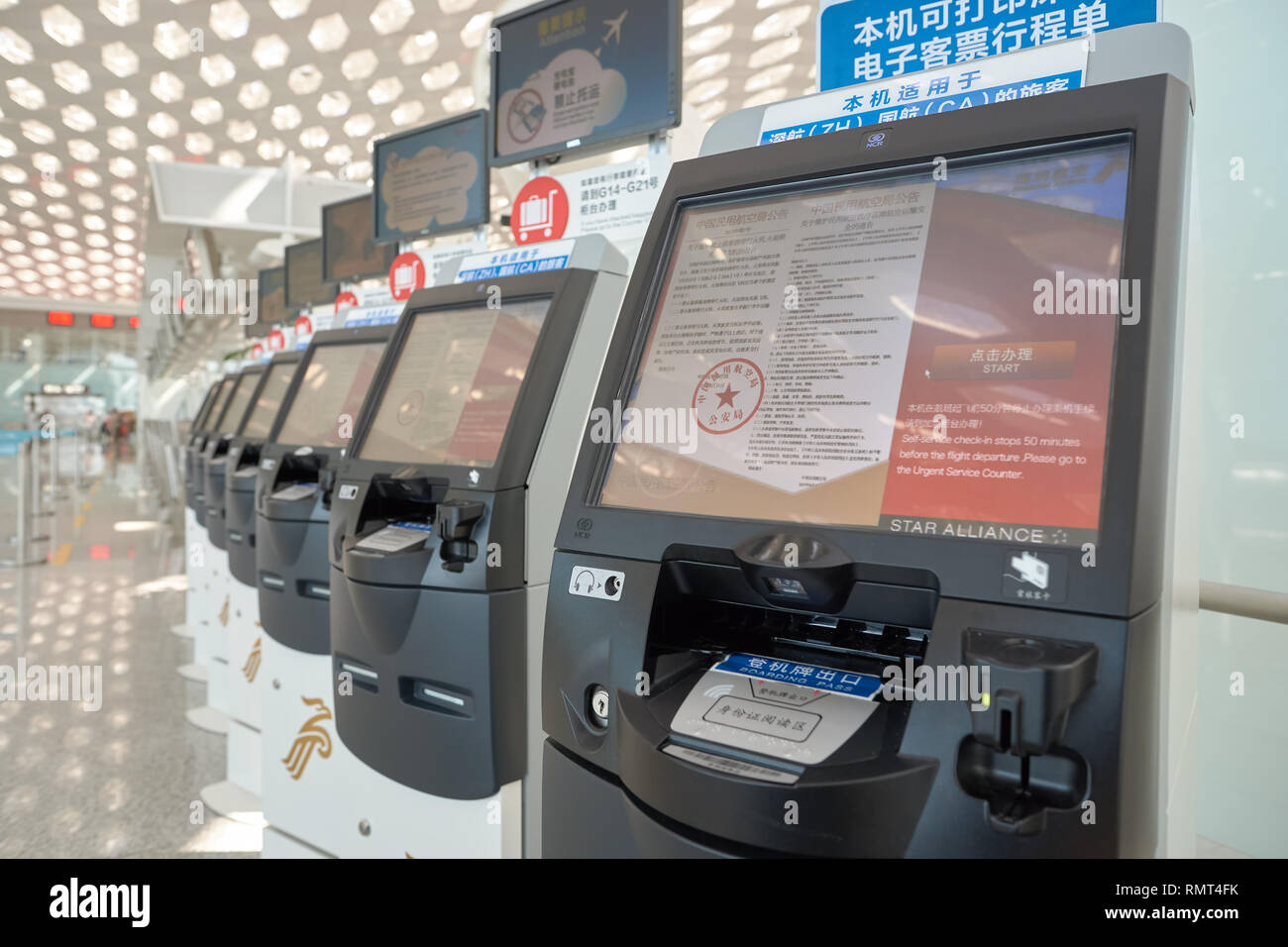 SHENZHEN, CHINA - CIRCA MAY, 2016: self check-in kiosks in Shenzhen Bao ...