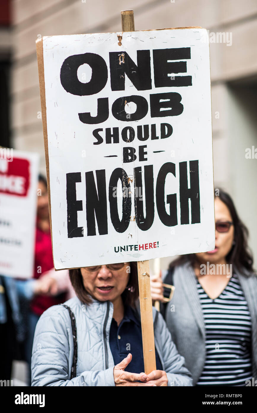 ONE JOB SHOULD BE ENOUGH. Protester outside St Francis, Westin Hotel. Unite Union. San Francisco. Stock Photo
