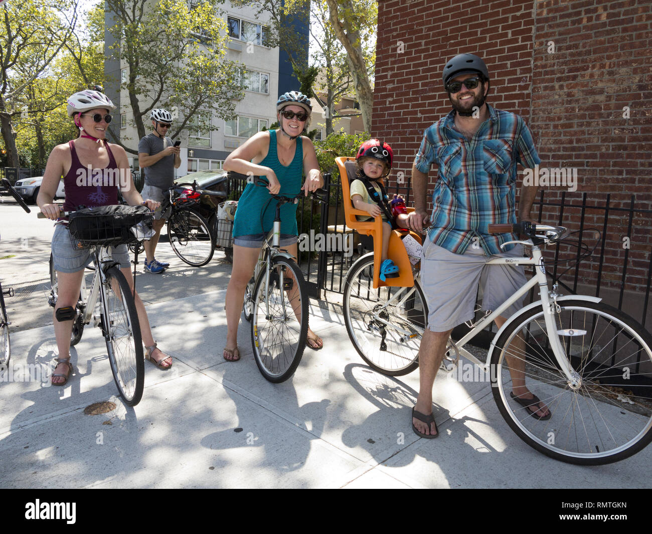 Group of cyclists in the Park Slope section of Brooklyn, NY, 2016. Stock Photo