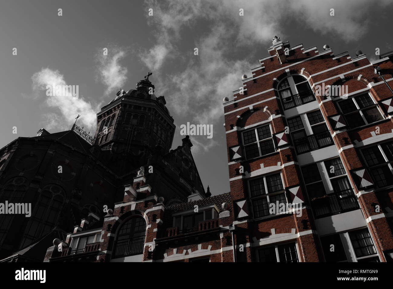 amsterdam - back of st. nicolas church and dutch gabled building. Stock Photo