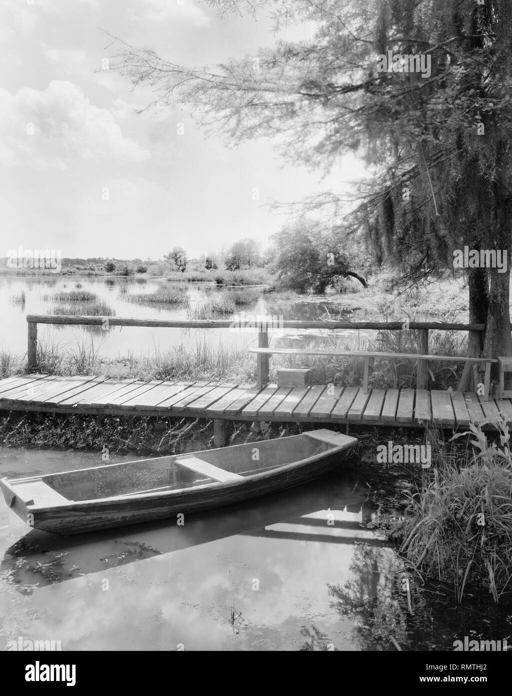 Rowboat at Dock, Charleston County, South Carolina, USA, Frances Benjamin Johnston, 1938 Stock Photo