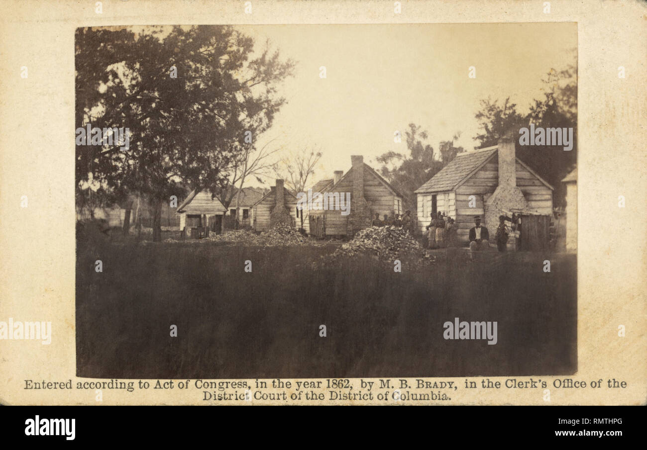 Slaves and Slave Quarters on Plantation, Port Royal, South Carolina, USA, Photograph by Timothy H. O'Sullivan, Copyrighted by Mathew B. Brady, 1862 Stock Photo