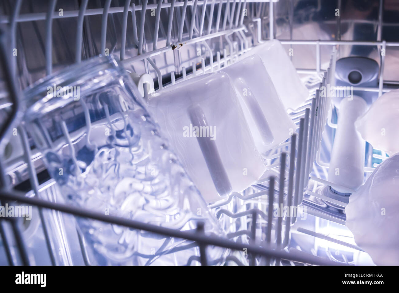 Dishes In The Open Dishwasher Inside Clean Dishware