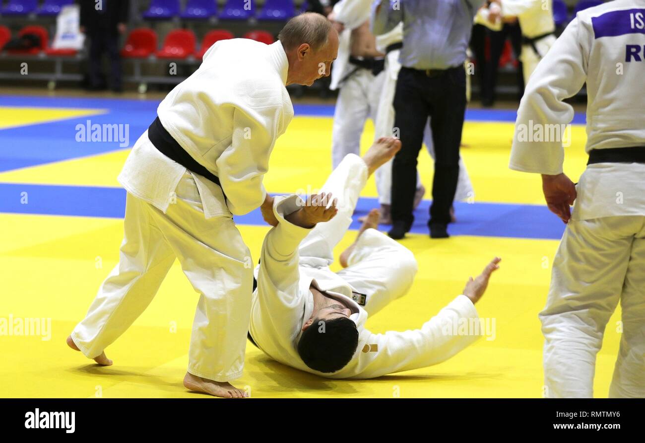 Russian President Vladimir Putin spars during judo practice with the Russian judo team during a visit to the Yug-Sport Training Centre February 14, 2019 in Sochi, Russia. Stock Photo