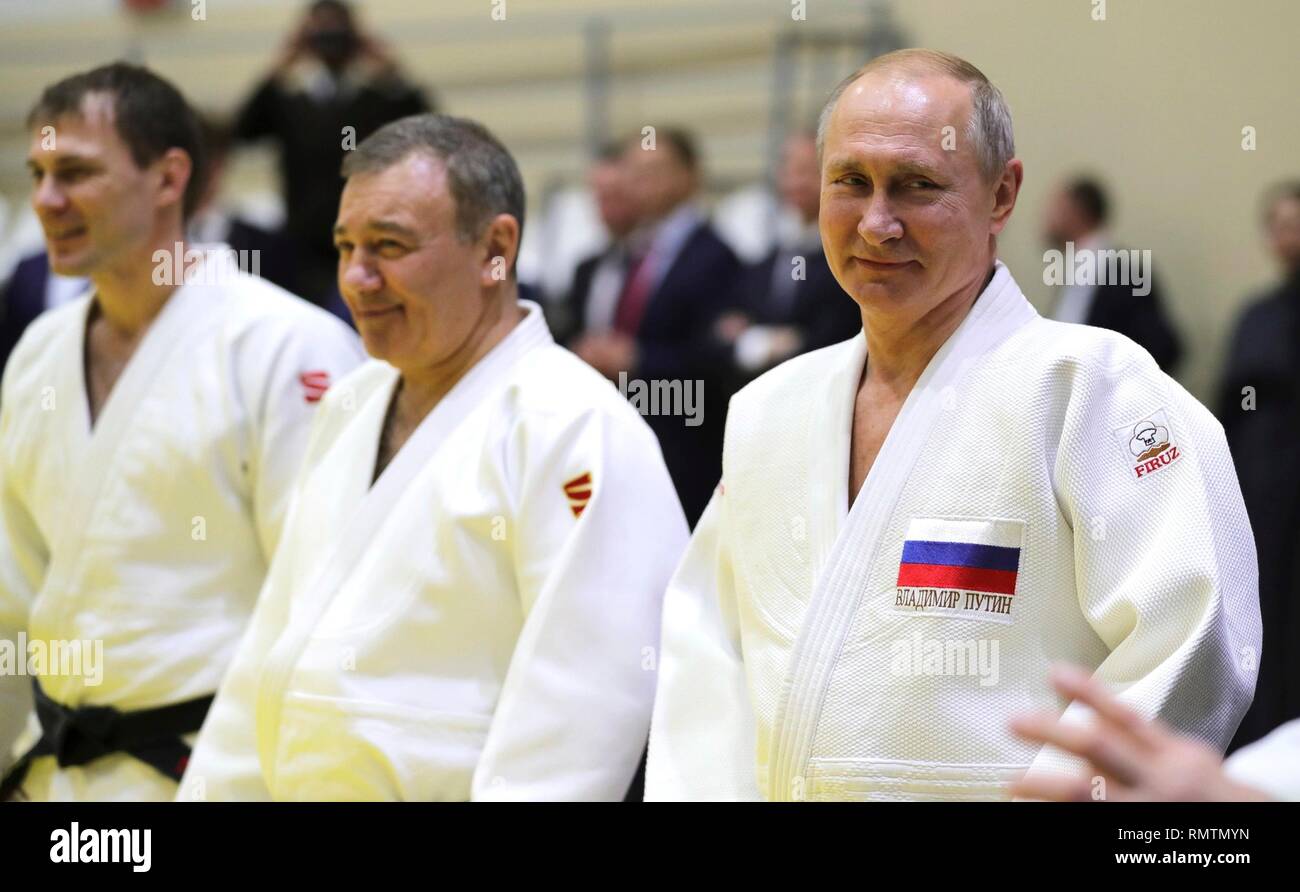 Russian President Vladimir Putin with the head coach of the Russian judo team Ezio Gamba, center, during judo practice at the Yug-Sport Training Centre February 14, 2019 in Sochi, Russia. Stock Photo