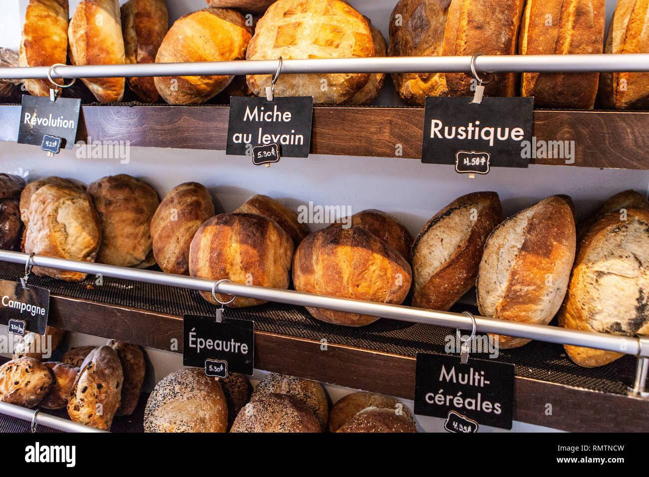 french-bakery-display-with-different-kinds-of-bread-loaves-stock-photo