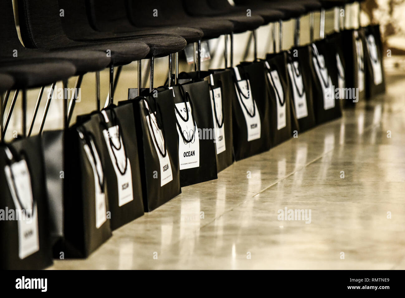 Ocean gift bags lined up in preparation of guests at Vin + Omi catwalk show  to launch London Fashion Week in Andaz London, UK. Audience presents Stock  Photo - Alamy