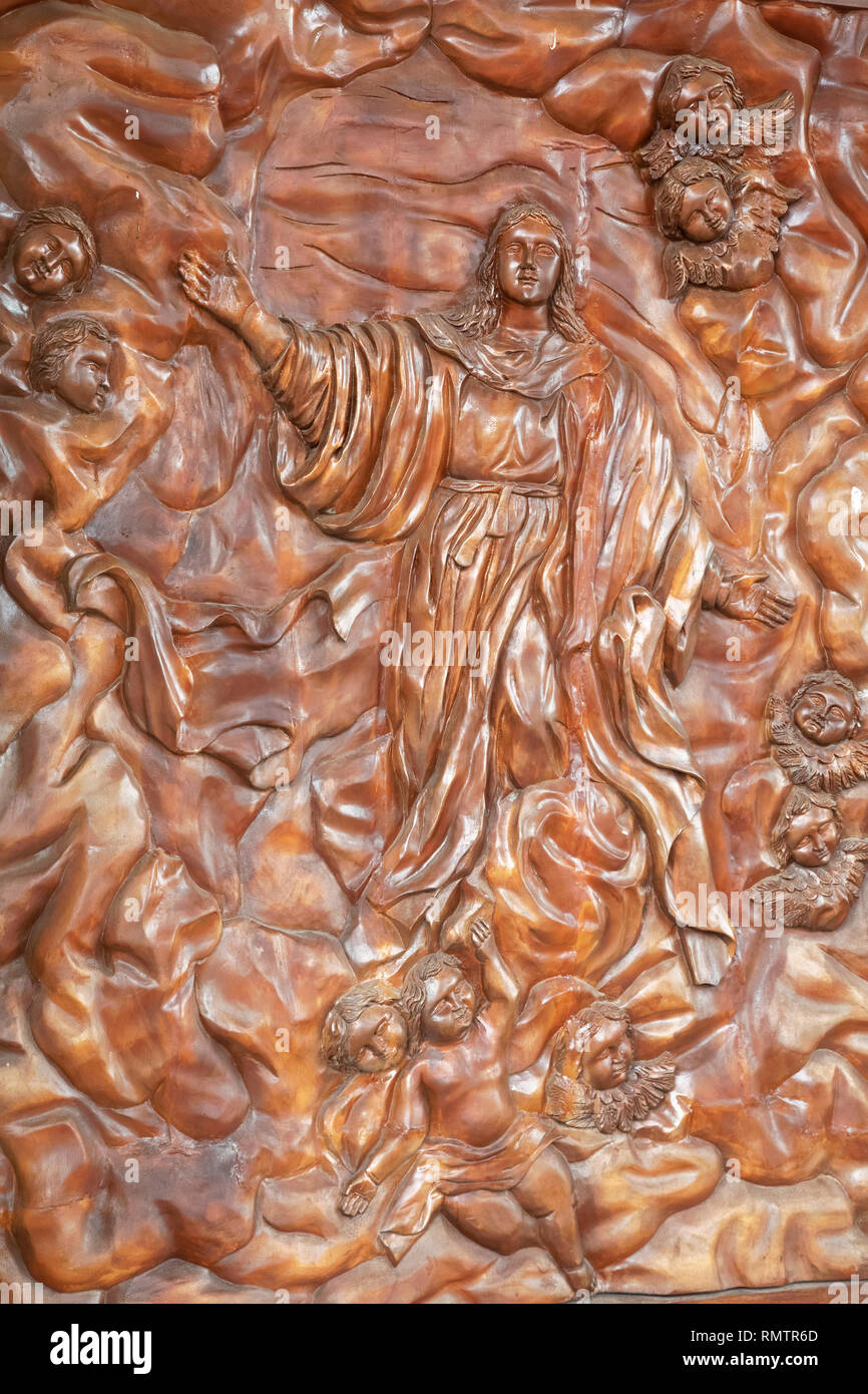 Carving of Jesus on the door of a Catholic Church in the Philippines Stock Photo