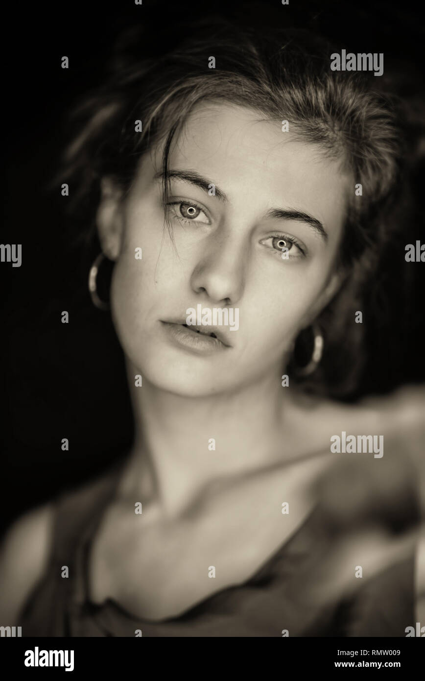 Vintage Retro Style Print On Old Paper Tones Photo Headshot Of A Beautiful Young Woman On Black Background Stock Photo Alamy