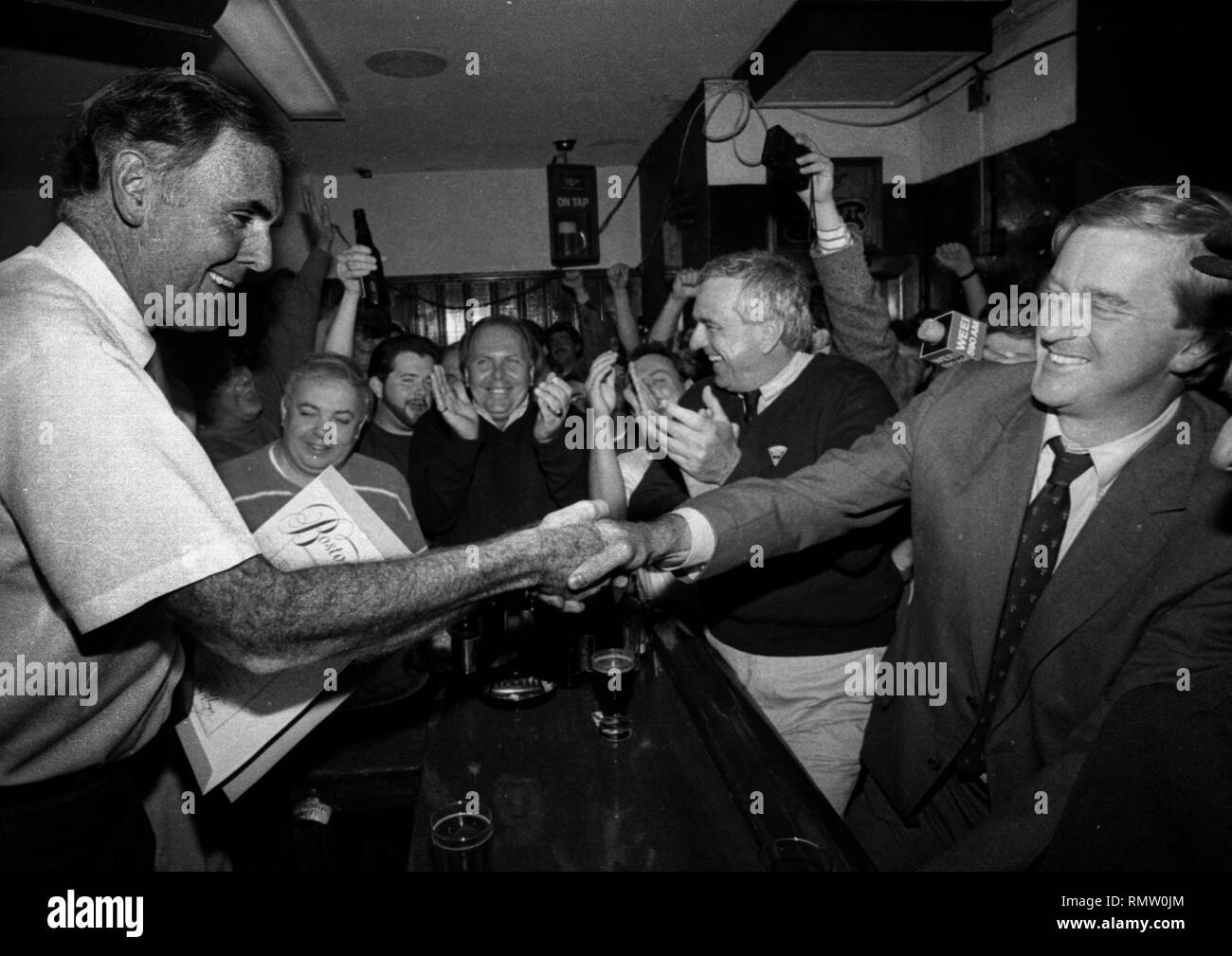 Former Massachusetts Governor Bill Weld announced he will run against President Donald Trump for the Republican Presidential nomination in 2020. In this photo Boston Mayor Ray Flynn with Massachusetts  Governor Bill Weld (R) during a campaign event at Foley's Tavern in Boston Ma USA  photo by bill Belknap 1995 Stock Photo