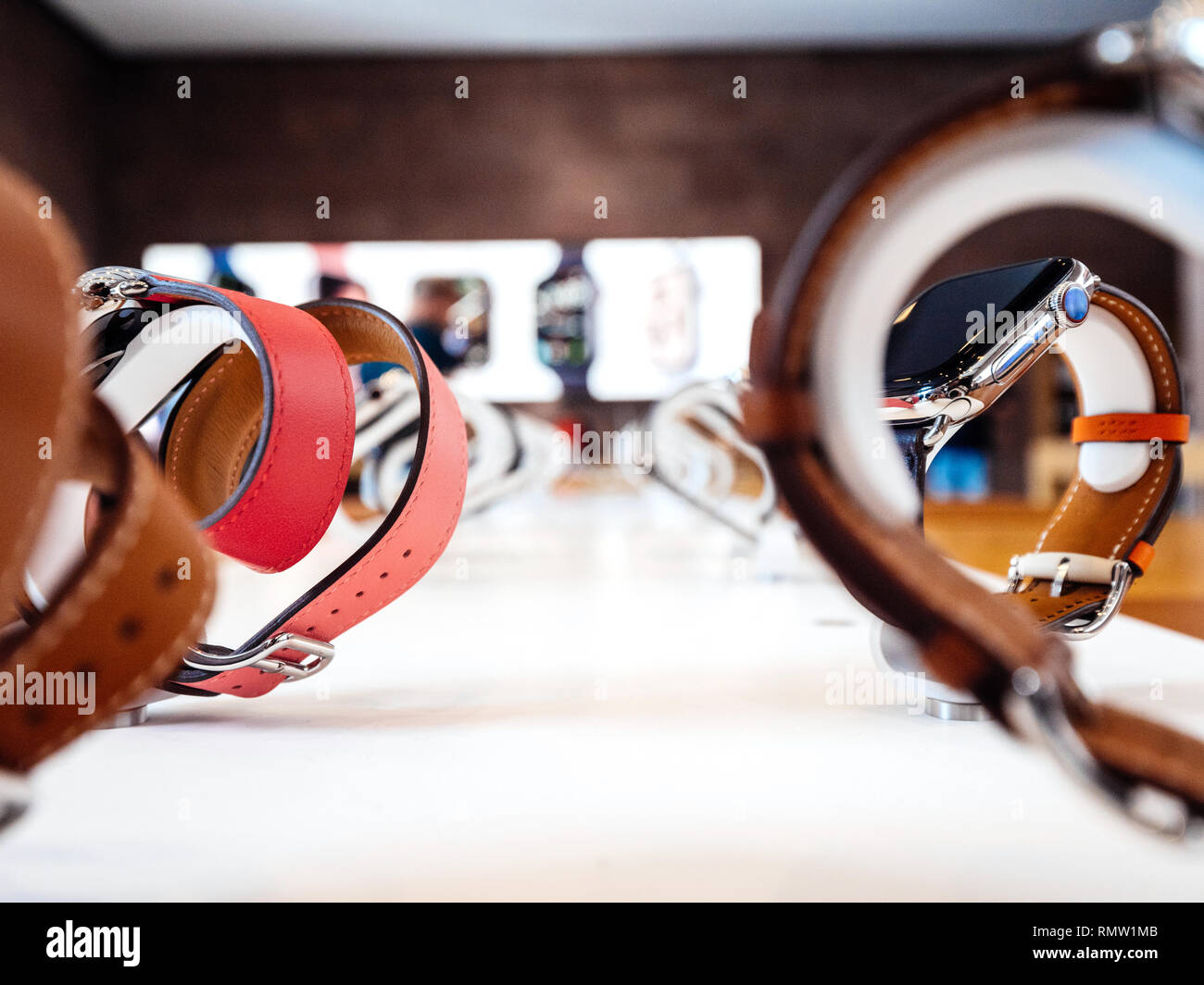 STRASBOURG, FRANCE - SEP 21, 2018: Apple Store with rows of new latest Watch Series 4 wearable devices with diverse straps Stock Photo