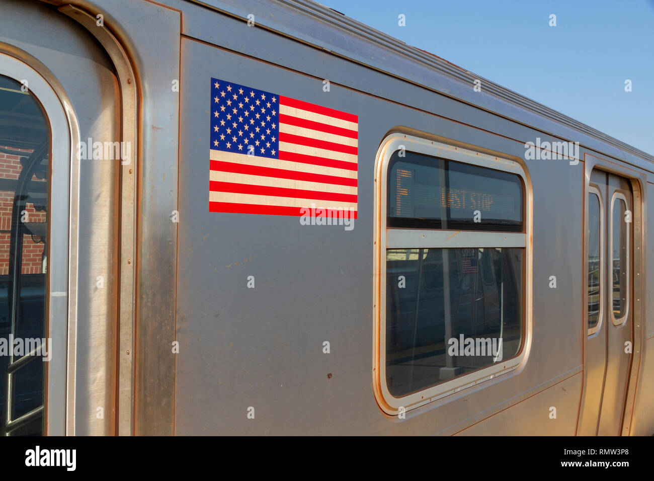 New York subway line in New York City with the flag of the USA Stock