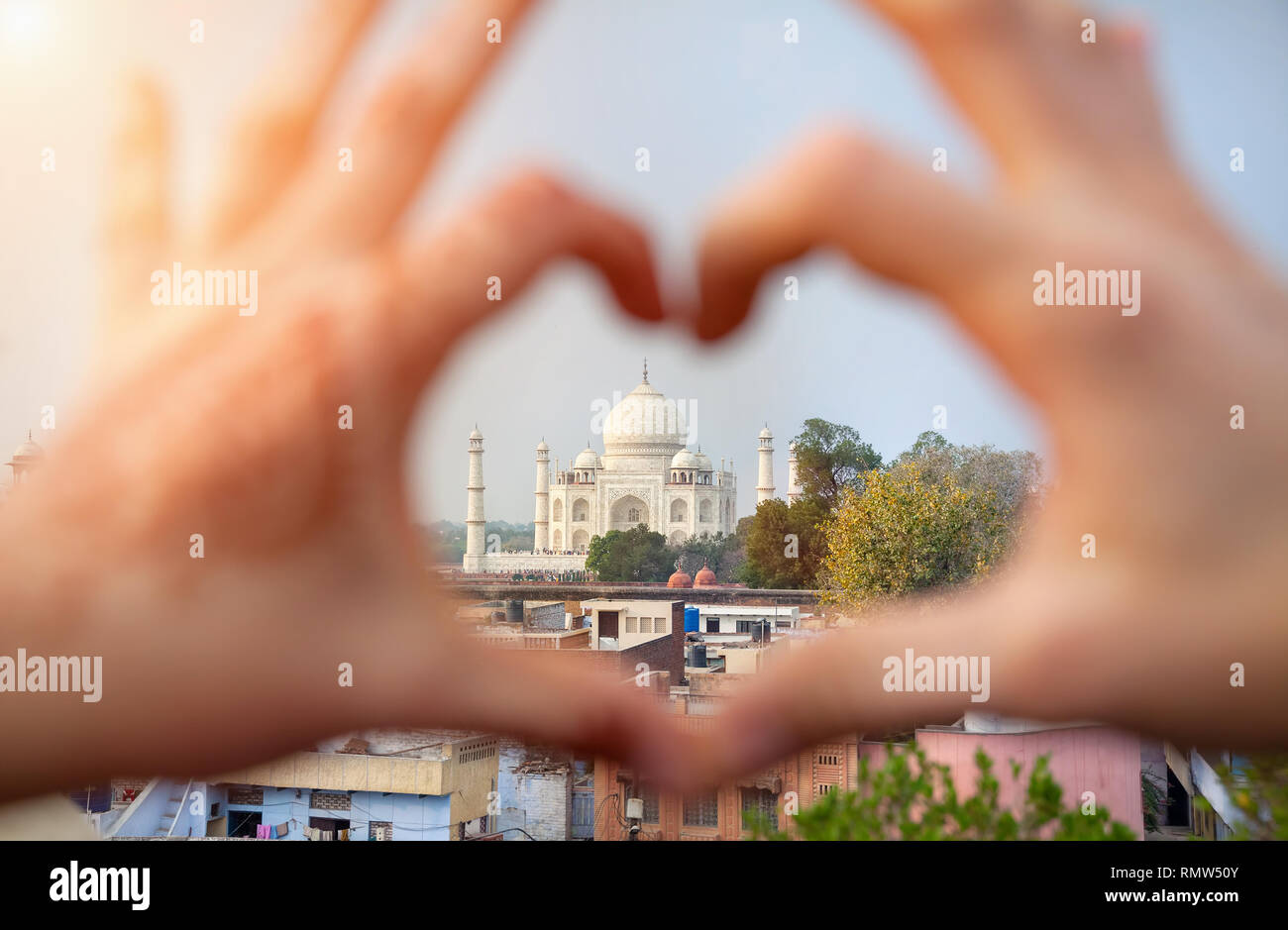 Woman hands with henna painting in shape of heart with Taj Mahal in it. I love India concept with copy space. Stock Photo