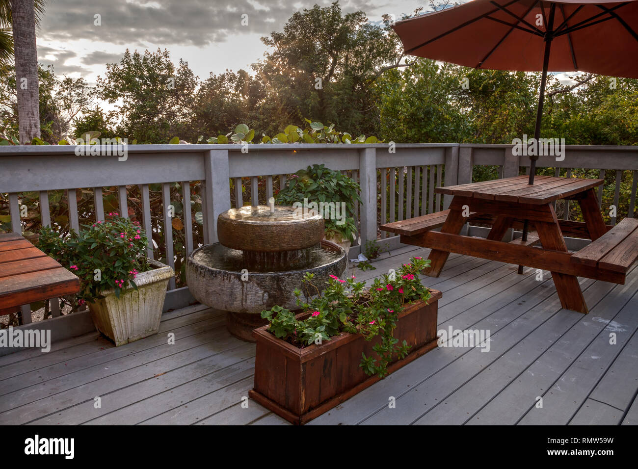 Picnic tables and umbrellas on a beach on Marco Island, Florida at