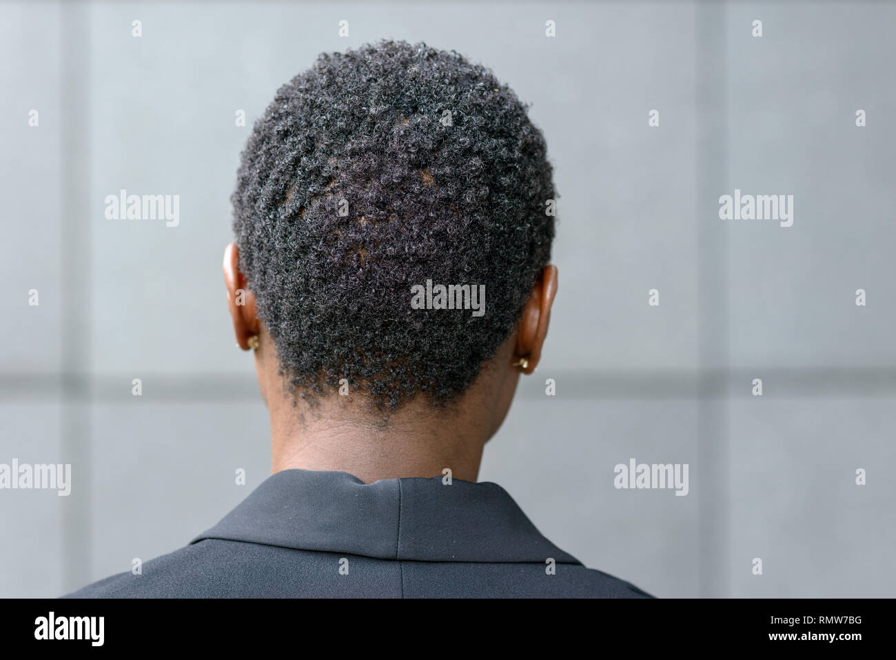 close up backview portrait of young black woman with short