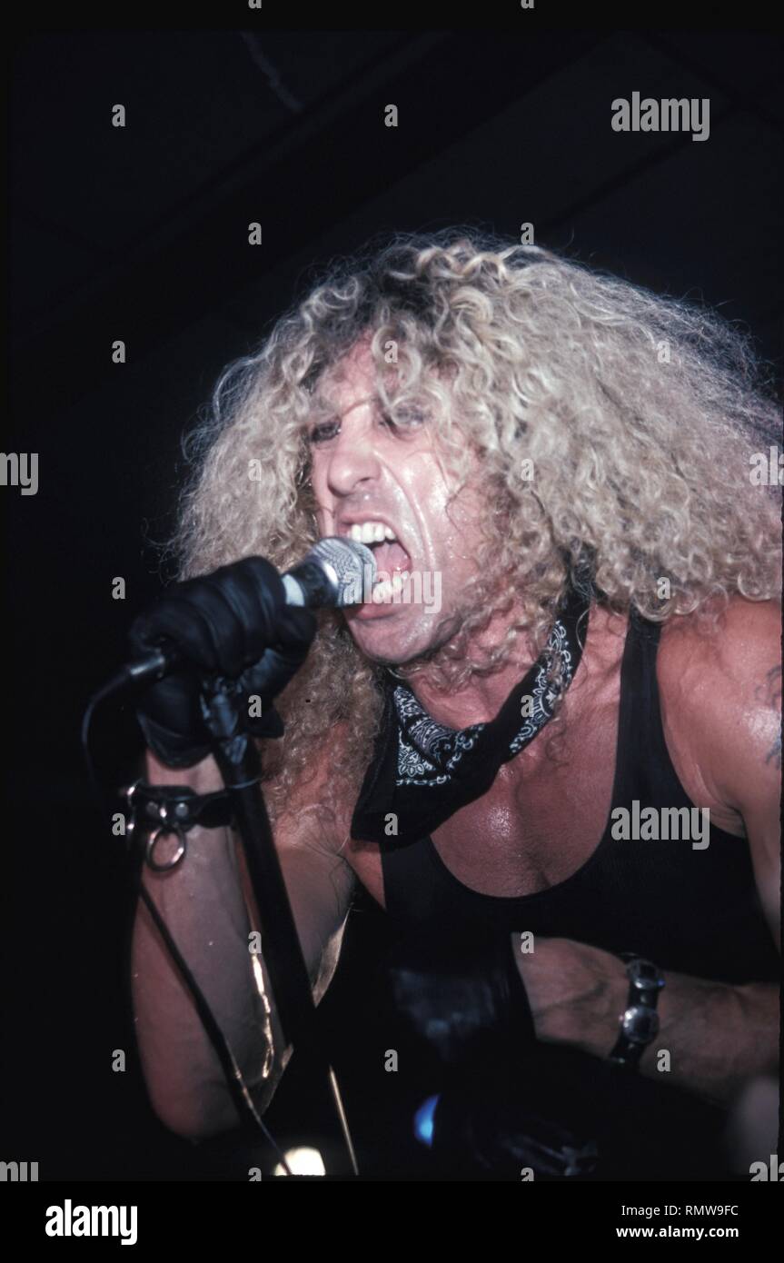 Musician, radio personality, and actor Dee Snider of the hard rock group Widowmaker is shown performing on stage during a 'live' concert appearance. Stock Photo